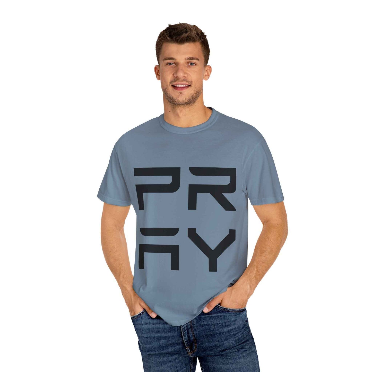 Model in dusty blue Pray Graphic T-Shirt with bold black typography, ideal for unisex casual and street style.