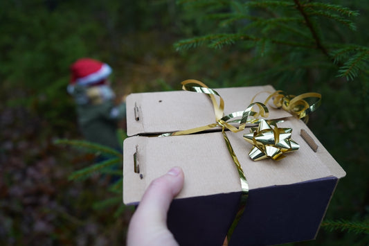 gold and silver cross pendant in box