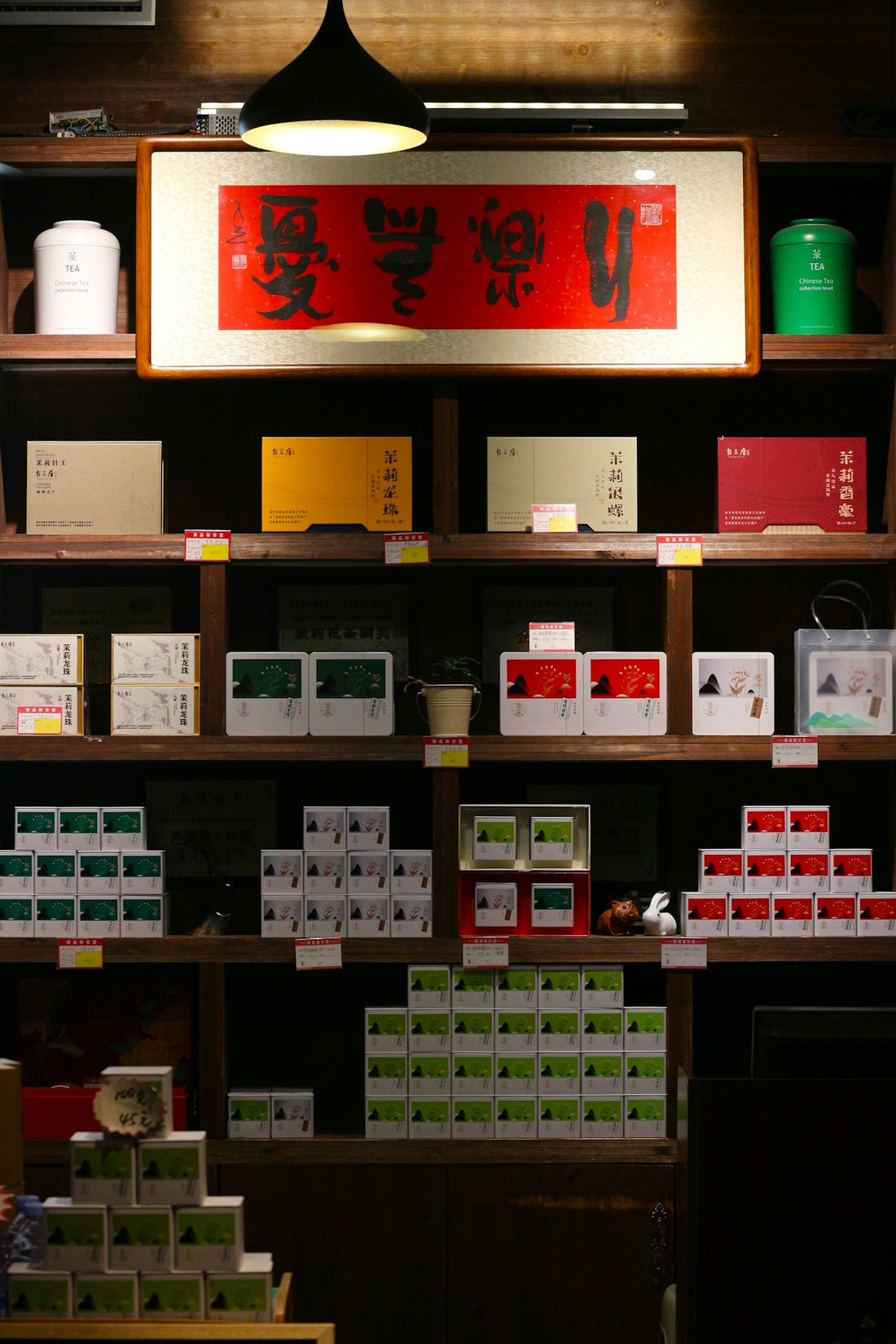 Shelves filled with boxes of tea and other products.