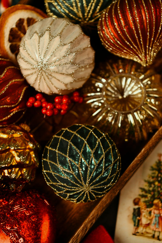 Assortment of festive christmas ornaments and dried orange slice